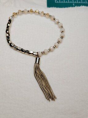 Stretch Bracelet with Pale Blush & Champagne Glass Beads and Silver‑Tone Tassel